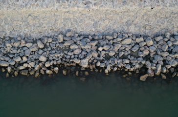 Little rocks at a beach - a rocky beach.